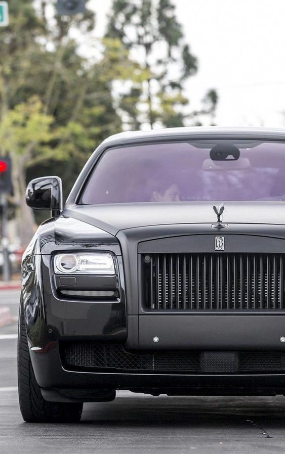 If all the cars in the United States were placed end to end, it would probably be Labor Day Weekend - Rolls Royce Ghost