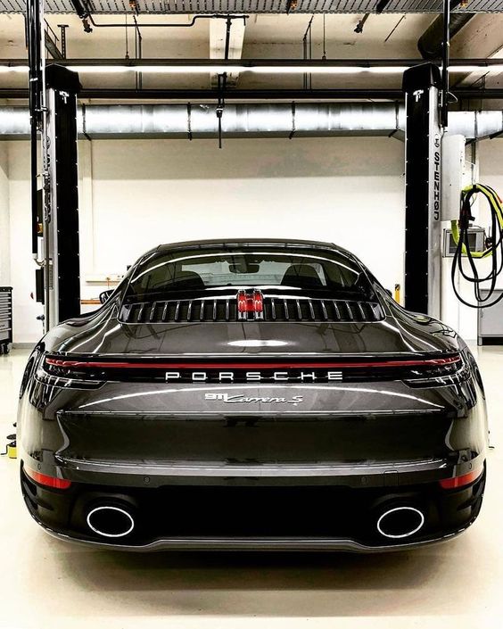 “A racing car is an animal with a thousand adjustments.” - New Porsche 911
