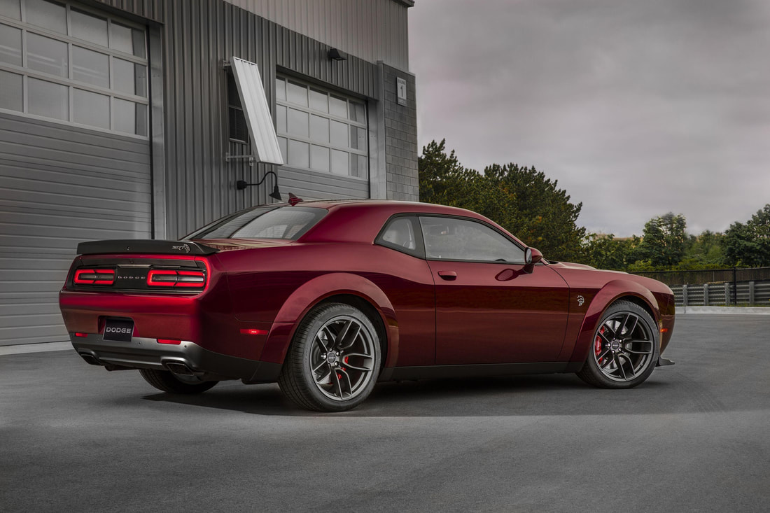 Challenger Srt8 bold, expressive styling, its large size, its luxurious interior